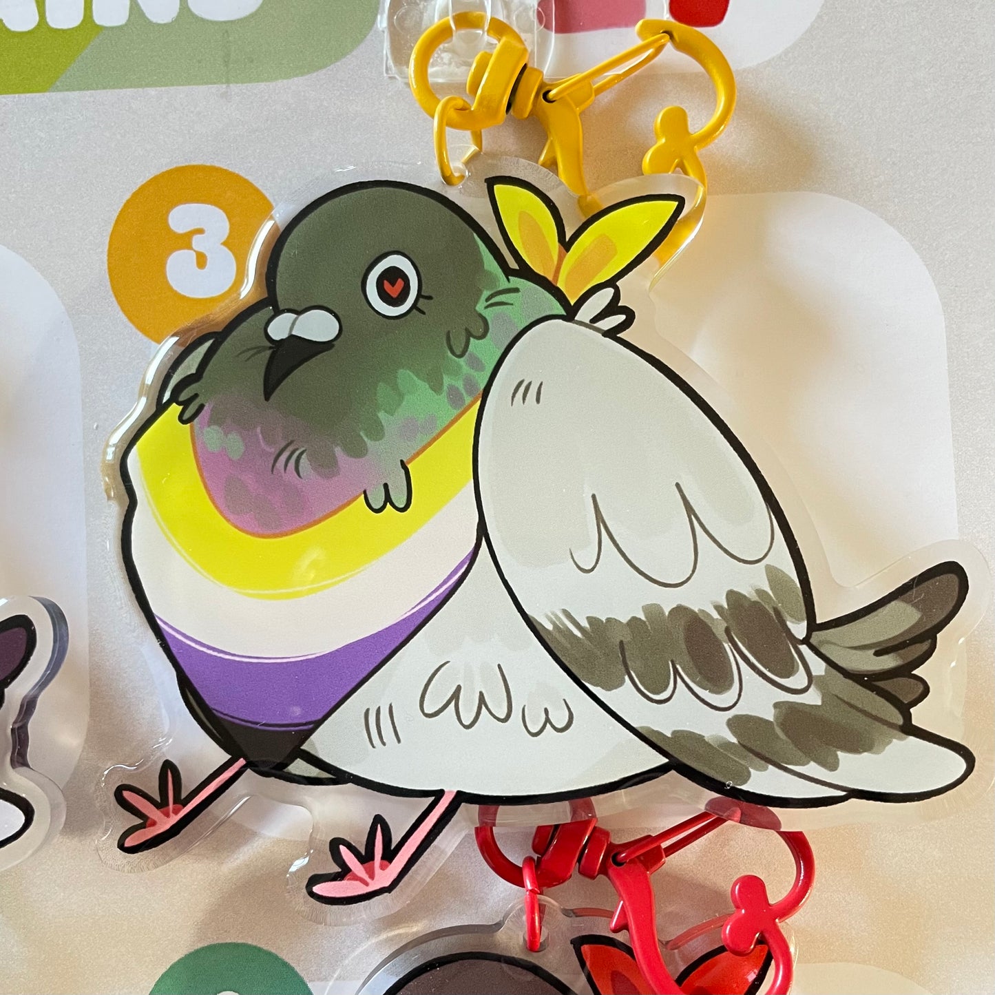 nonbinary pigeon keychain